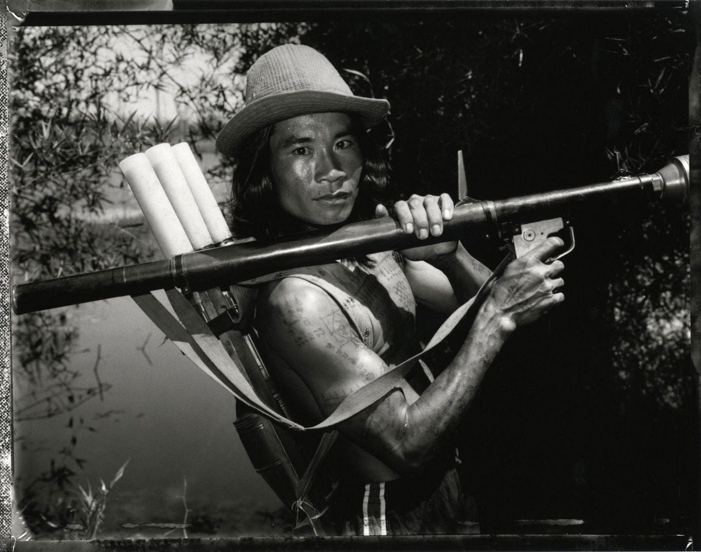 Bill Burke: "KPNLF Fighter with RPG, Lake Ampil, Thai Cambodia Border, 1984," Limited Edition Gelatin Silver Print (Open Edition; Print Size 20x24")