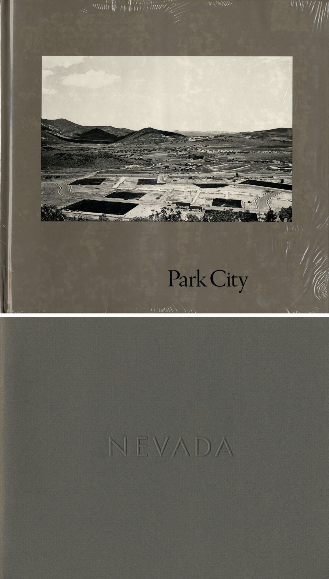 Lewis Baltz: Park City (First Edition) [SIGNED] (New condition with publisher's shrink-wrap) -- INCLUDES a copy of Lewis Baltz: Nevada (First Edition) [SIGNED] & copy of the publisher ARTSPACE's original 1980 book release announcement