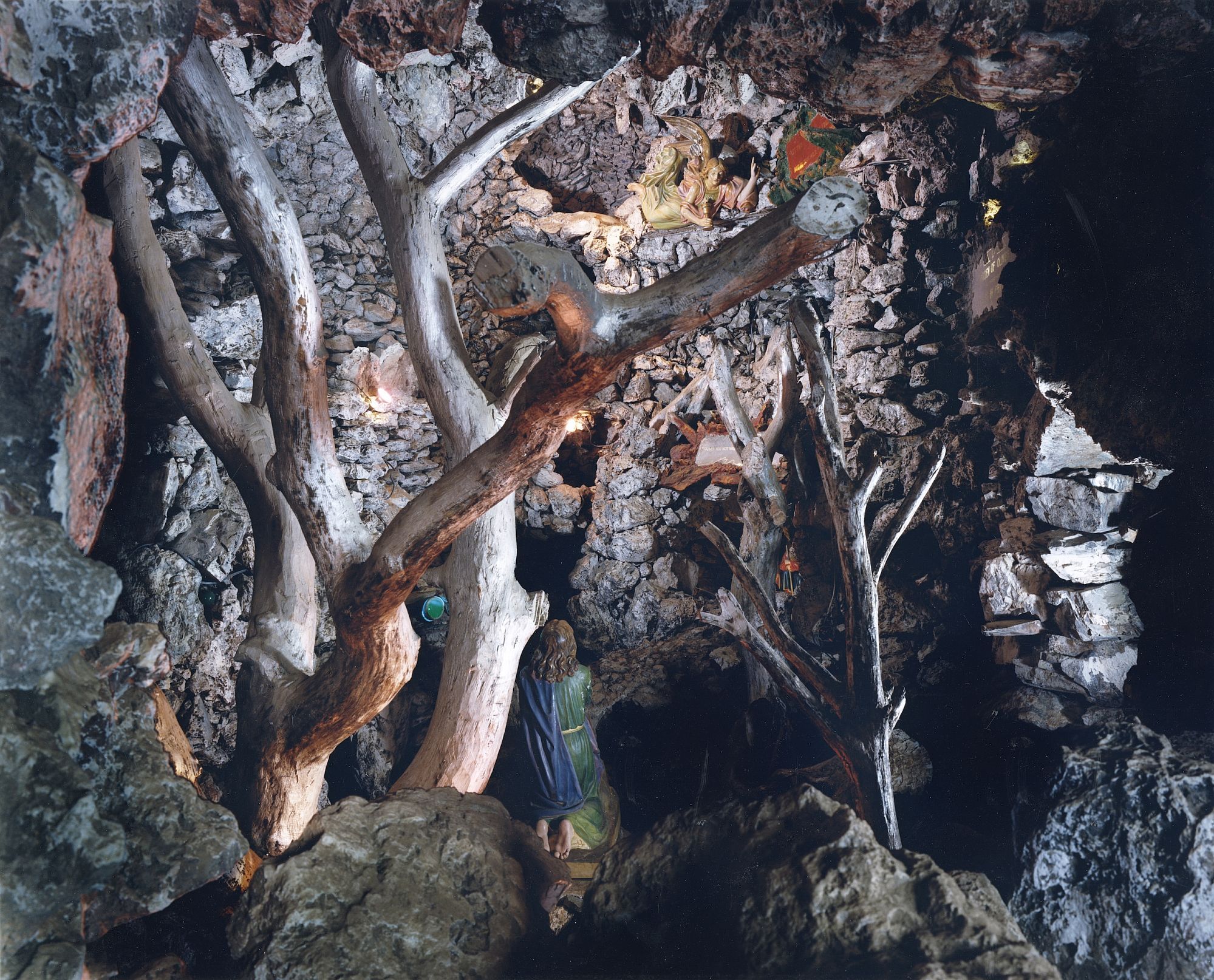 Vincent Borrelli: "Christ in Prayer in the Garden of Olives, The Grotto Shrine by Fr . Philip J Wagner, Wisconsin, 1988" (30x40" Type-C Print), Limited Edition (from the Series "Folk Art Environments")